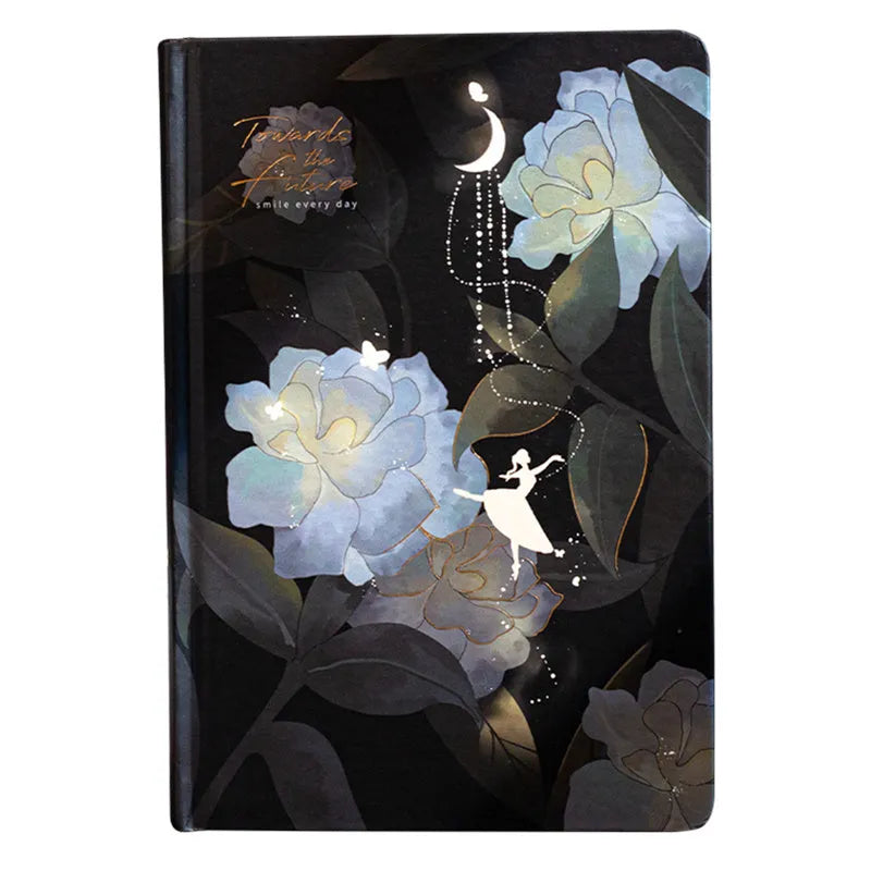 A5 notebook with luminous cover in Deep Blue, open to show 100 gsm paper and colour illustrations