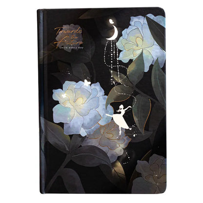 A5 notebook with luminous cover in Deep Blue, open to show 100 gsm paper and colour illustrations