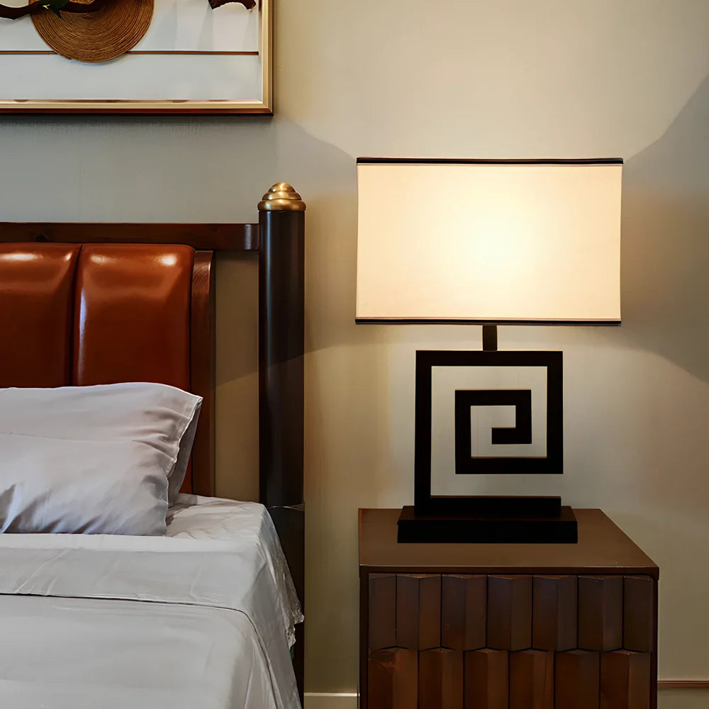 Retro style table lamp with fabric shade and iron base, remote control operation