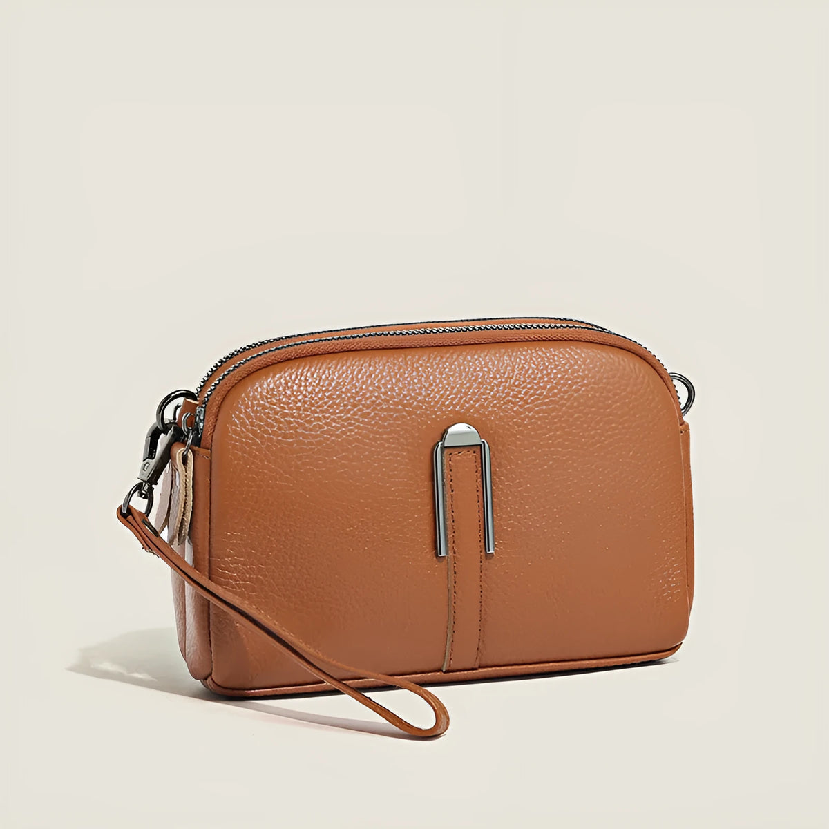 Minimalist top-grain leather crossbody bag in horizontal square shape with inner pockets, available in five colours
