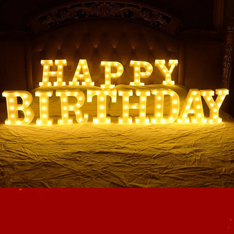 Plastic LED alphabet letter light spelling a message for a birthday or proposal.