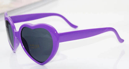 Stylish heart-shaped lighting sunglasses with a plastic frame and resin lenses, creating a mesmerizing effect for romantic occasions