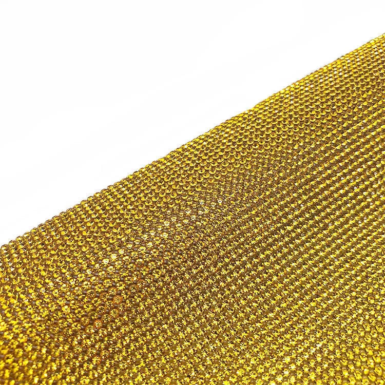 Rhinestone sticker net on backing sheet for hot drilling application to fabrics in multiple colour options