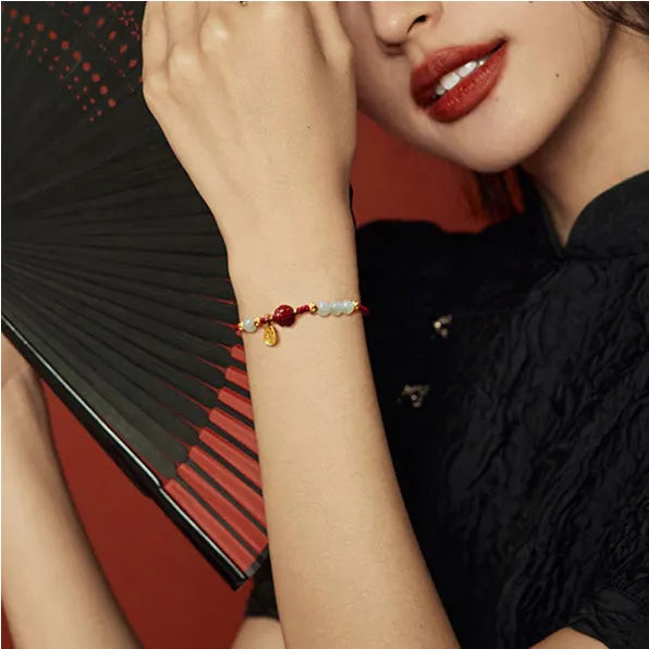 Women's adjustable bracelet with Hetian jade, cinnabar red rope and 925 silver chain