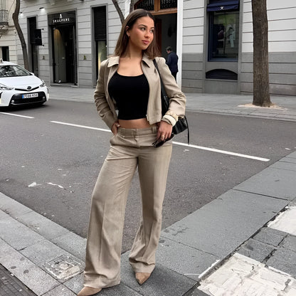 Women's herringbone pattern long sleeve coat and trousers suit with 3D embroidery.