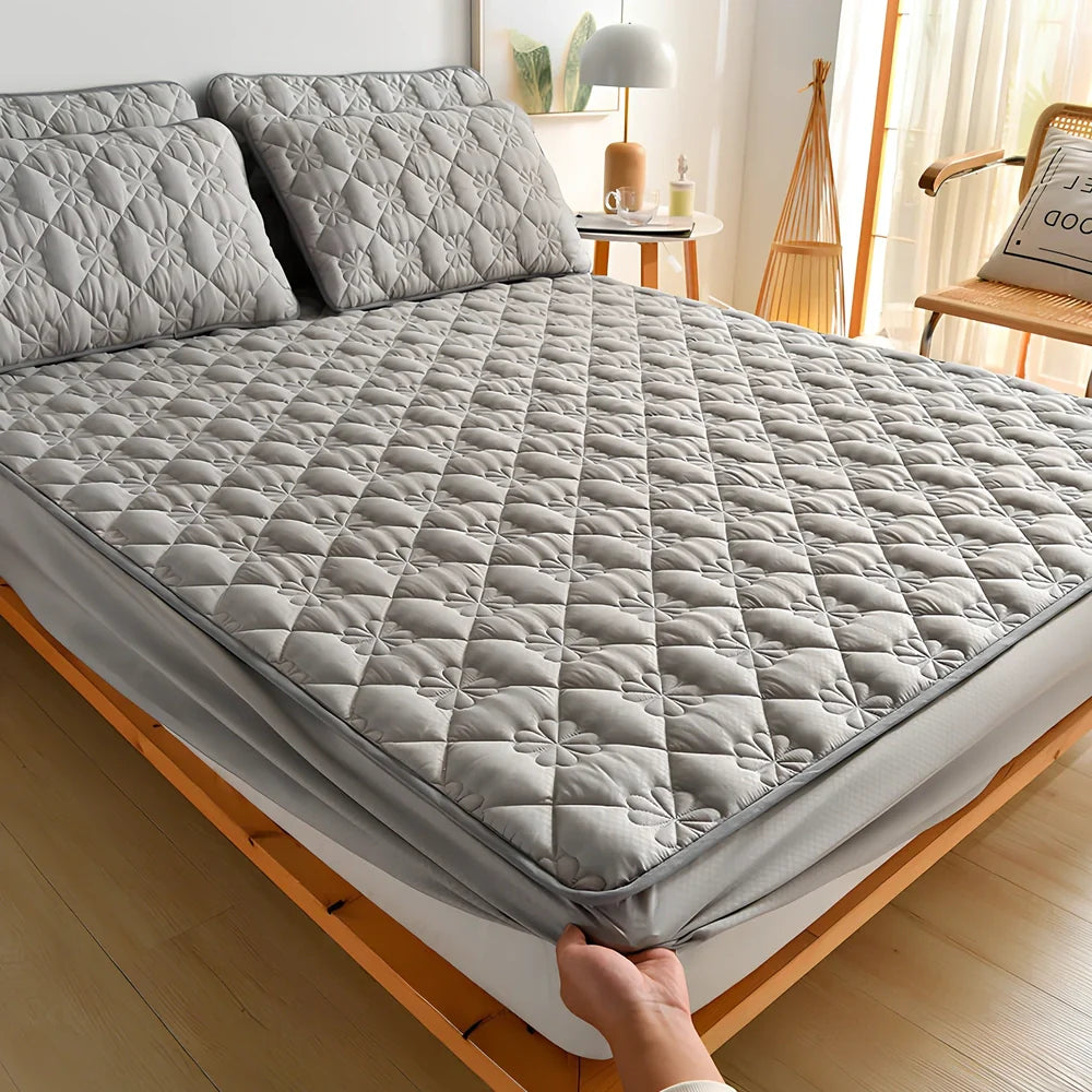 Mattress cover dust cover with brushed weave texture shown on bed, includes bed cover and pillowcase
