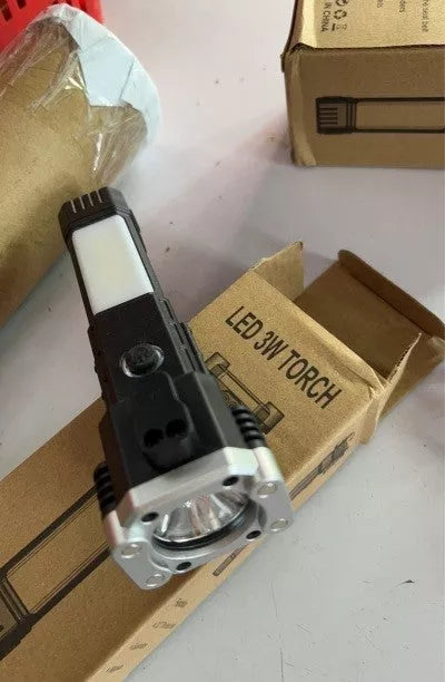 Multifunctional car safety hammer with LED flashlight and USB charging port