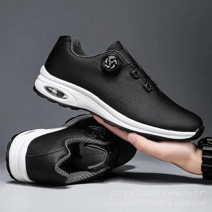 Low-top black mesh casual tennis shoes with cross shoulder straps and white composite sole