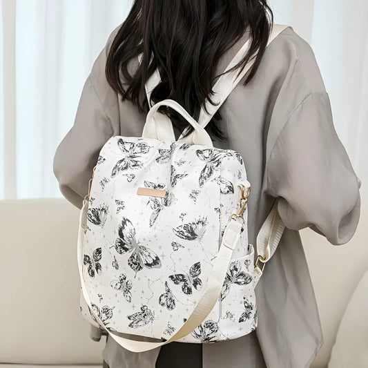 Butterfly printed large capacity PU backpack in various colours with sewing line details and an ergonomic back.