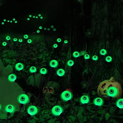 Solar-powered Halloween string lights with detailed eyeball design for outdoor garden decoration