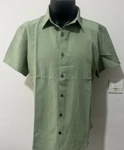 Men's light blue short sleeve linen blend casual shirt with a loose fit.