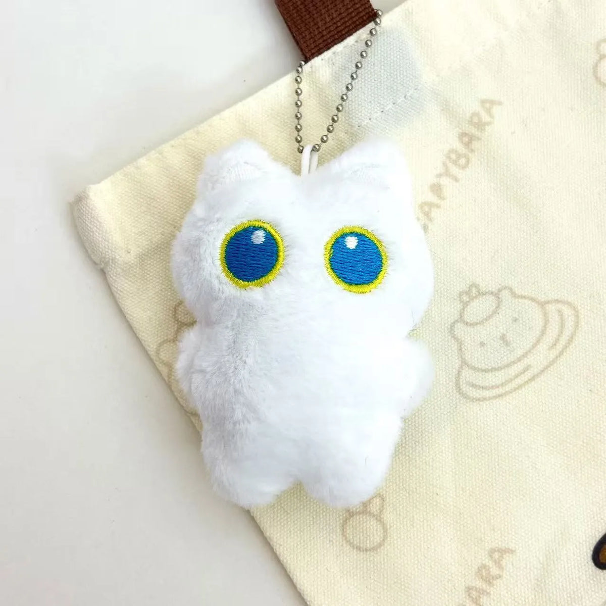 Cartoon big eye black cat plush doll key decoration with optional bead necklace