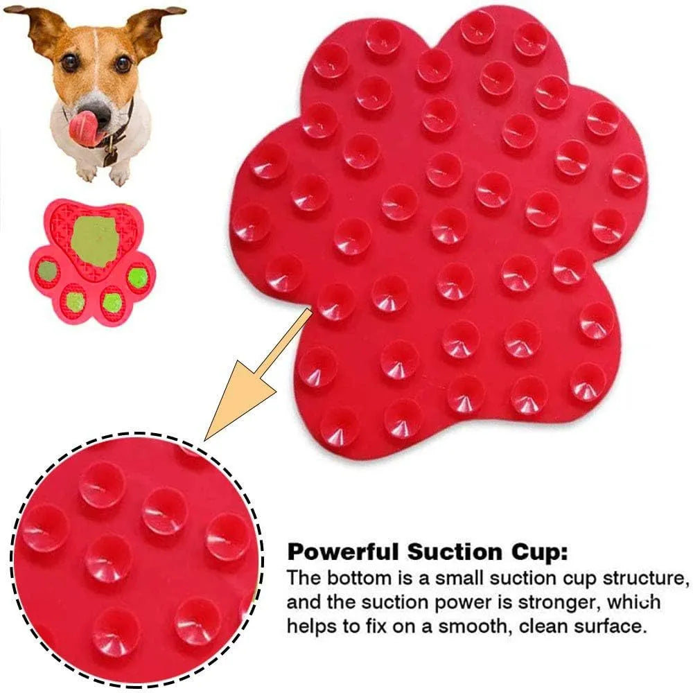 Blue bone-shaped dog licking mat with suction cups on a smooth surface, measuring 18x18cm