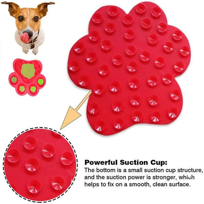 Blue bone-shaped dog licking mat with suction cups on a smooth surface, measuring 18x18cm