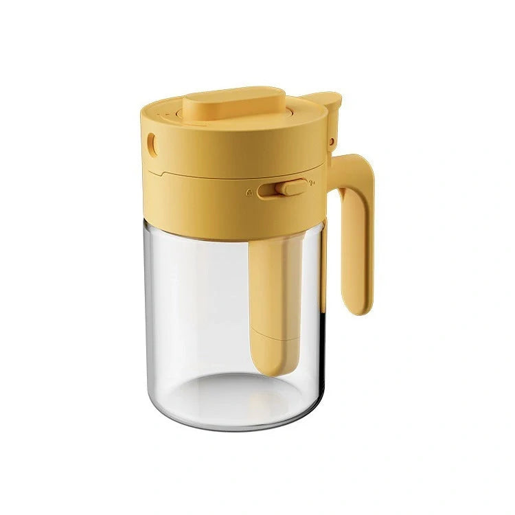 Small glass seasoning jars with lids and spoons in various colors for kitchen organization