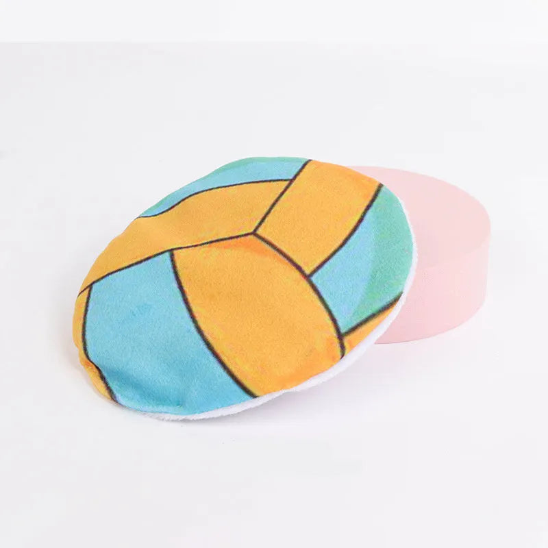 Soft plush cat toy shaped like a flying disc with a sports ball pattern, containing catnip and a crinkle sound layer.
