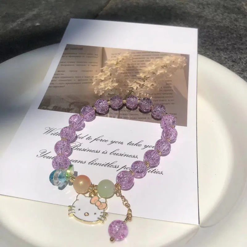 Chinese style glass bead bracelet with bamboo joint design on wrist.