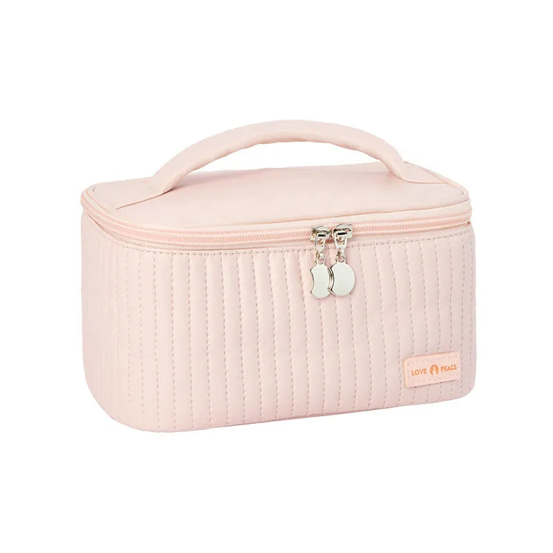 Open-top cake makeup bag in six colour options with PU leather construction and 20cm dimensions