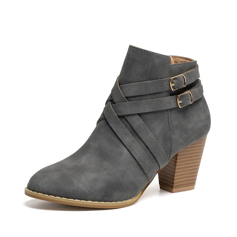 Women's plus size black PU leather short ankle boots with a 7cm heel and side zipper.