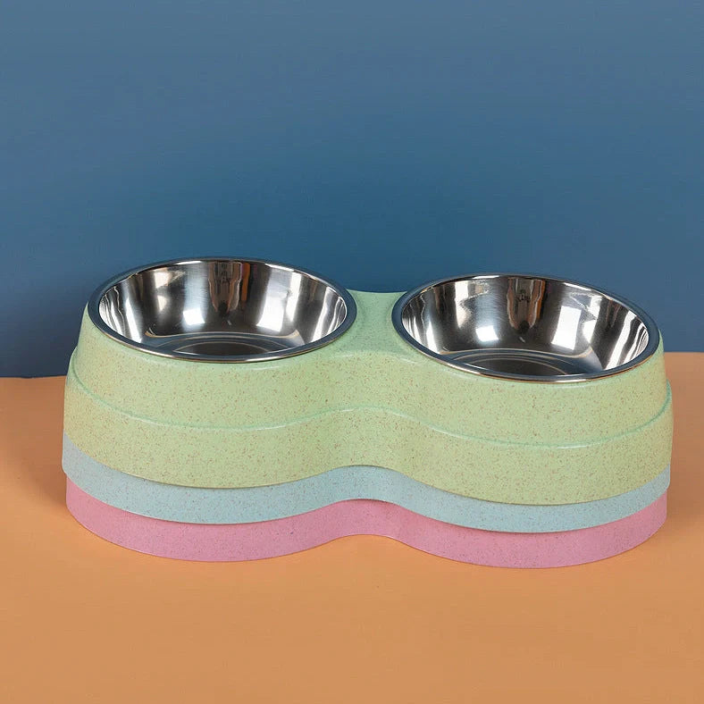 Double pet bowl with stainless steel insert and straw base in blue, showing separate food and water compartments