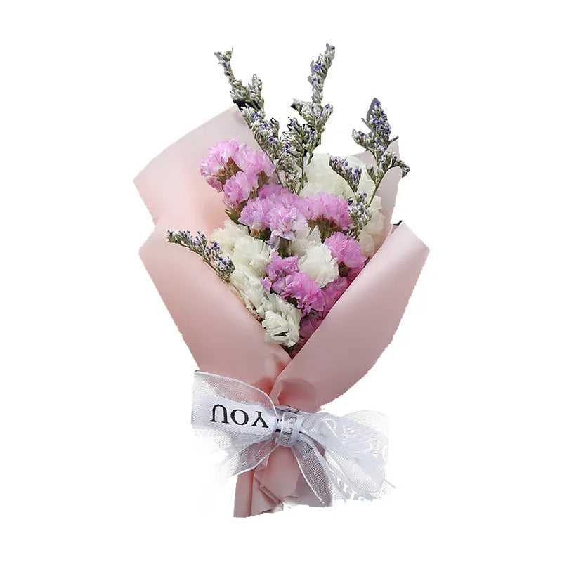 Mini dried flower bouquet mounted in car air vent for decorative aromatherapy