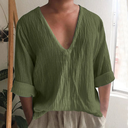 Men's washed cotton long sleeve V-neck t-shirt in a solid colour on a hanger.