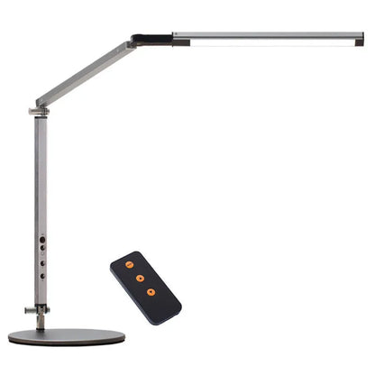 Clip-on adjustable arm LED desk lamp in black mounted on a desk edge with remote control.