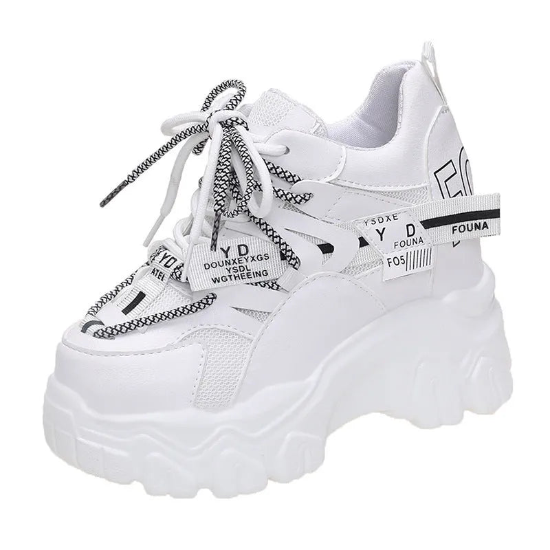 Women's white breathable mesh platform sports shoes with cross-strap detail and rubber sole