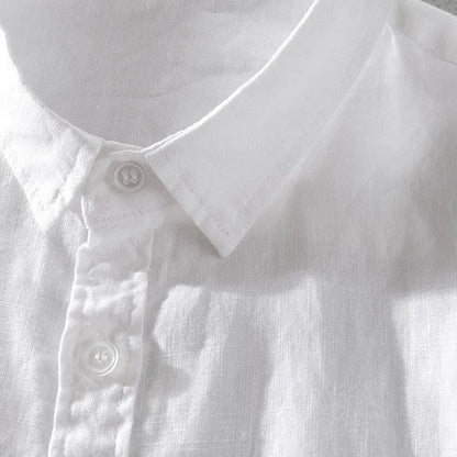 Men's light blue short sleeve linen blend casual shirt with a loose fit.