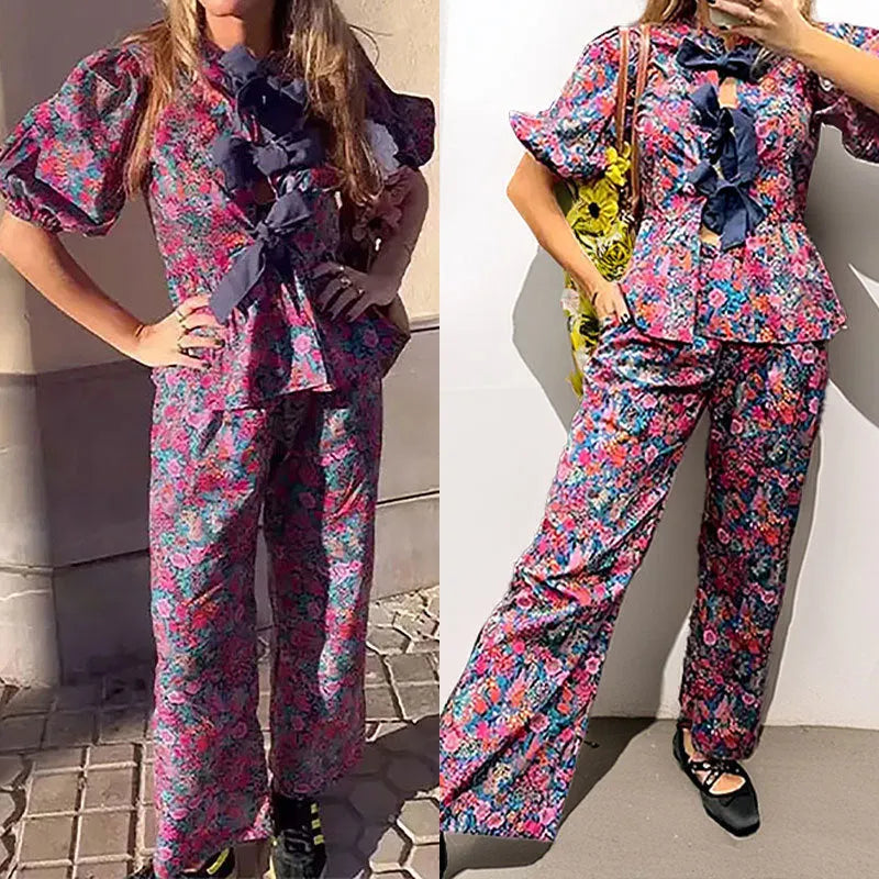 Floral print trousers suit with puff sleeves and tie-neck top in picture colour