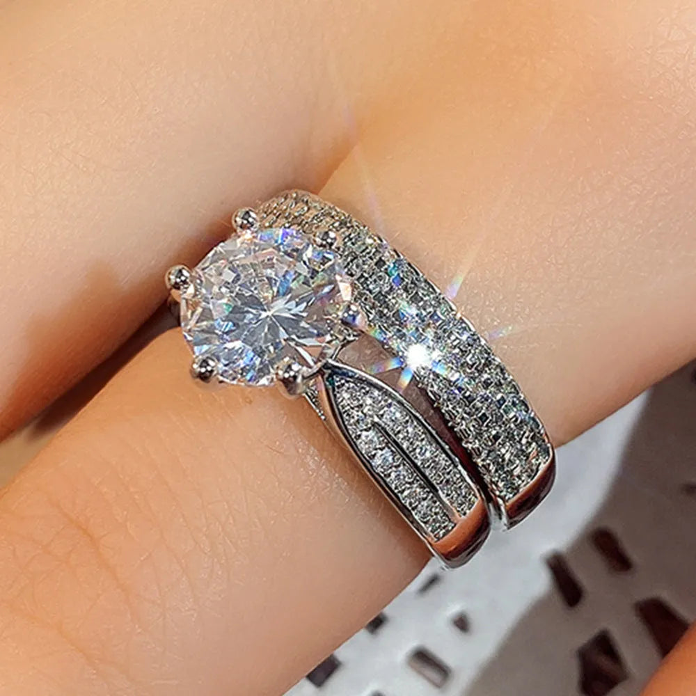 White gold colour combined ring bracelet with geometric design and round elements, showing size options 5-11