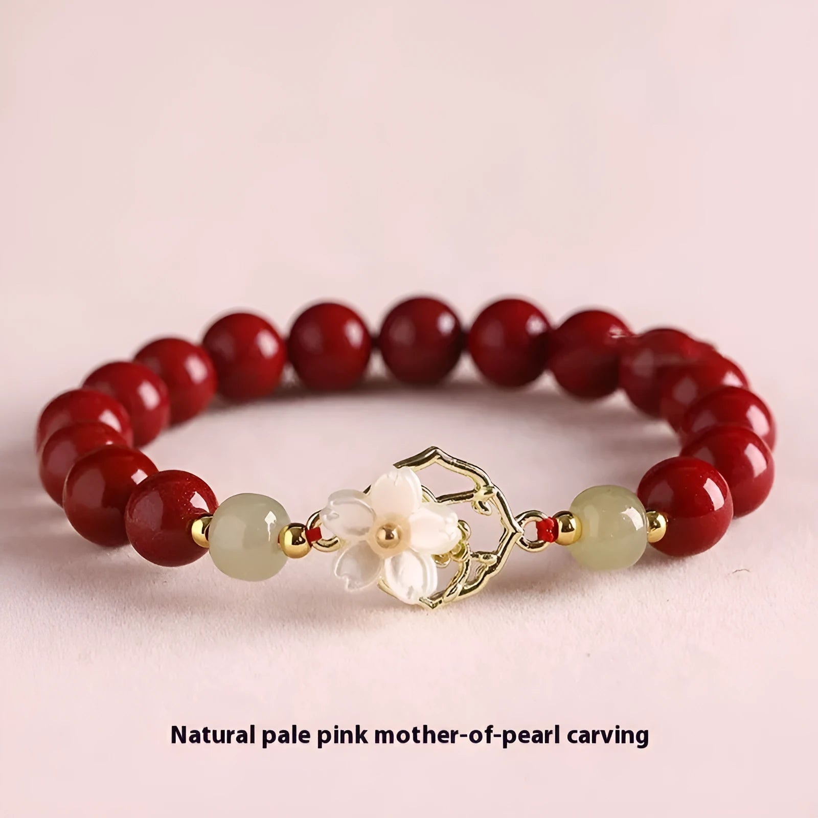 Handcrafted Hetian Jade New Chinese style bracelet in cinnabar with white butterfly, lotus and bells of Ireland motifs