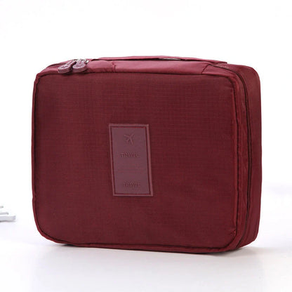Stylish portable makeup bag with waterproof divider, multi-compartment storage, and variety of color options