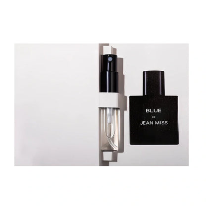 Men's woody citrus perfume bottle in black or blue, 100ml with spray, featuring sandalwood and cedar notes for lasting fragrance