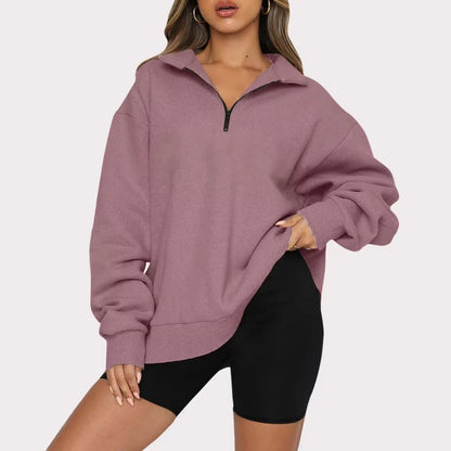 Women's zip turndown collar sweatshirt in various colors, showcasing loose fit and zipper detail.