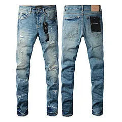 A pair of black men's slim-fit skinny jeans with a straight-leg pencil pants silhouette on a mannequin.