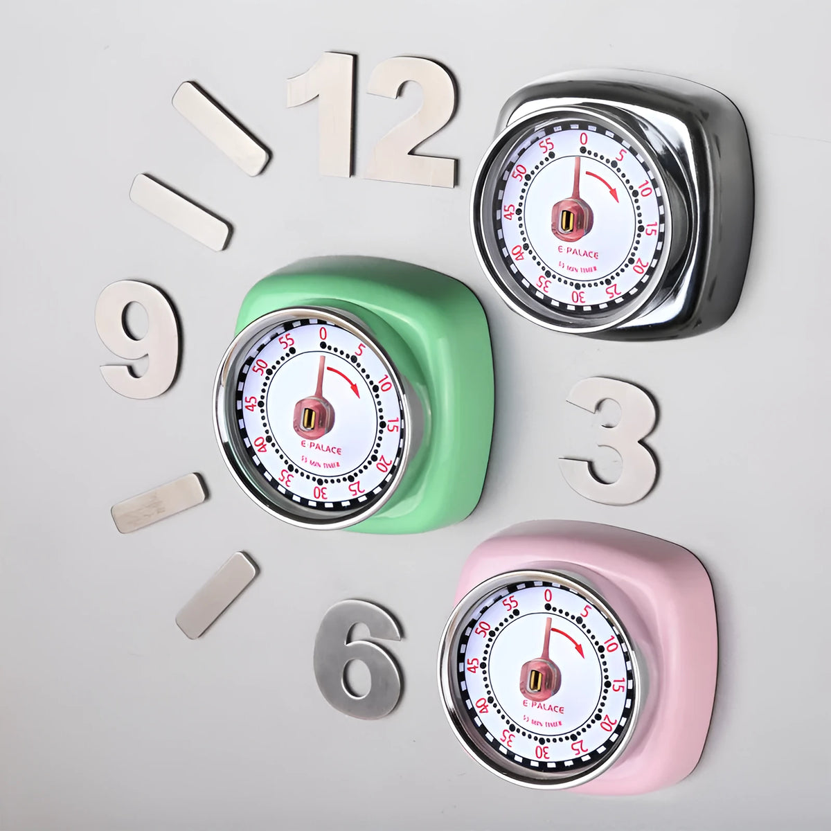 Metal kitchen timer clock with square circle design, shown in green, pink, or mirror light options.
