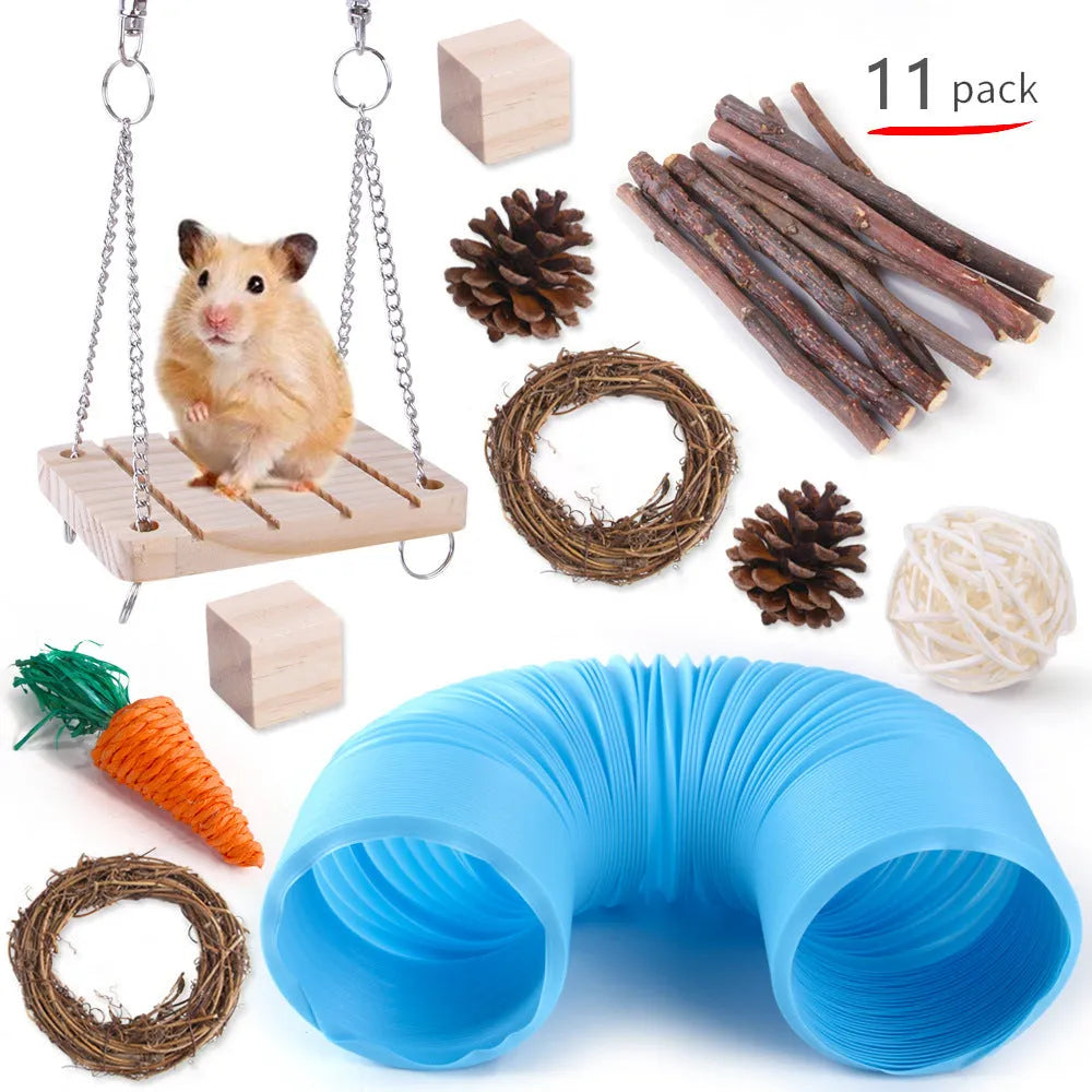 Assortment of wooden and natural fibre chew toys for small pets including balls, rings and woven shapes.