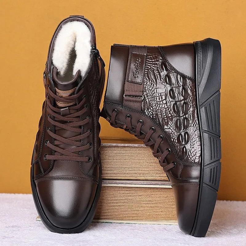 Black fur-lined genuine leather lace-up snow boots with a textured rubber sole on a wooden floor.