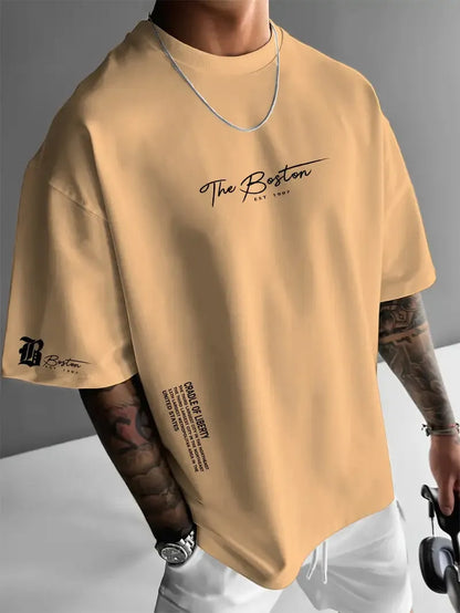 Men's round neck loose letter short sleeve T-shirt in polyester, shown in white, black, coral, and apricot