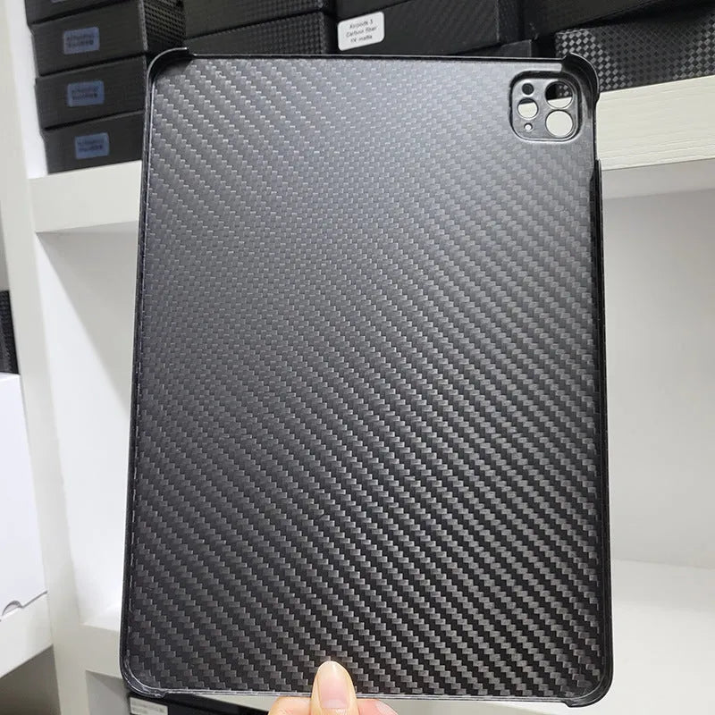 Carbon fibre protective cover for iPad Pro 11 showing 3K matte fine hole texture and embossed plaid pattern