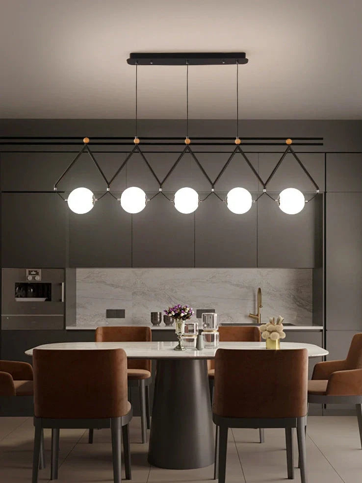 Multi-head LED pendant lamp with glass shades in black or gold, measuring 45-120cm diameter