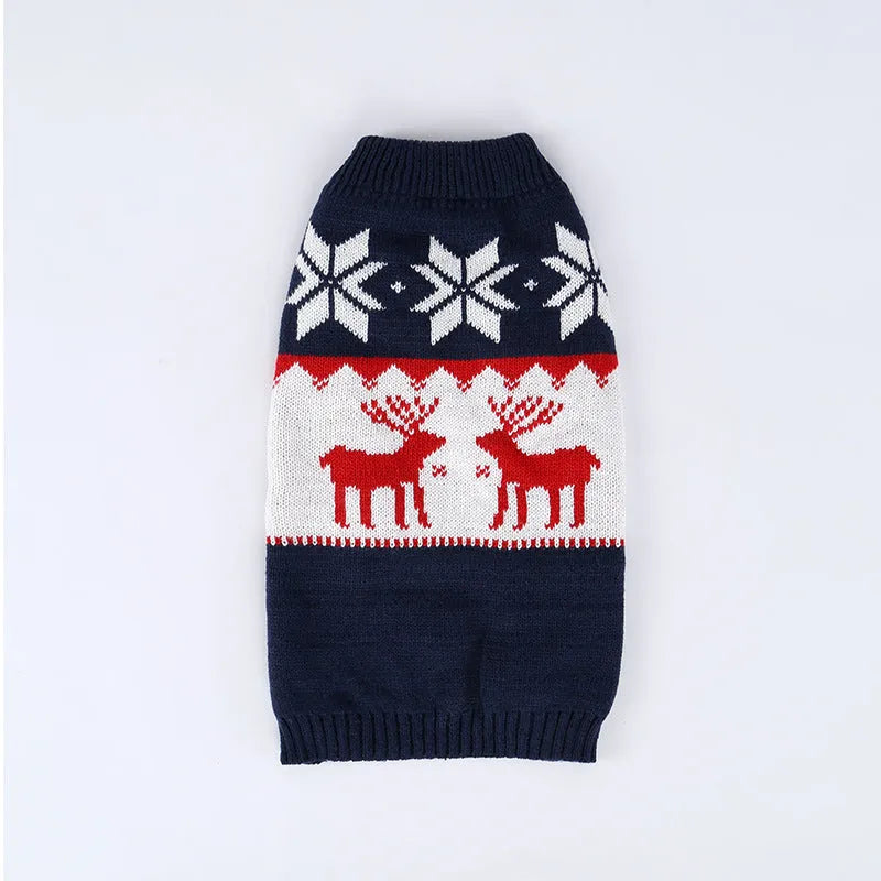 Navy blue knitted Christmas sweater for dogs on a festive background