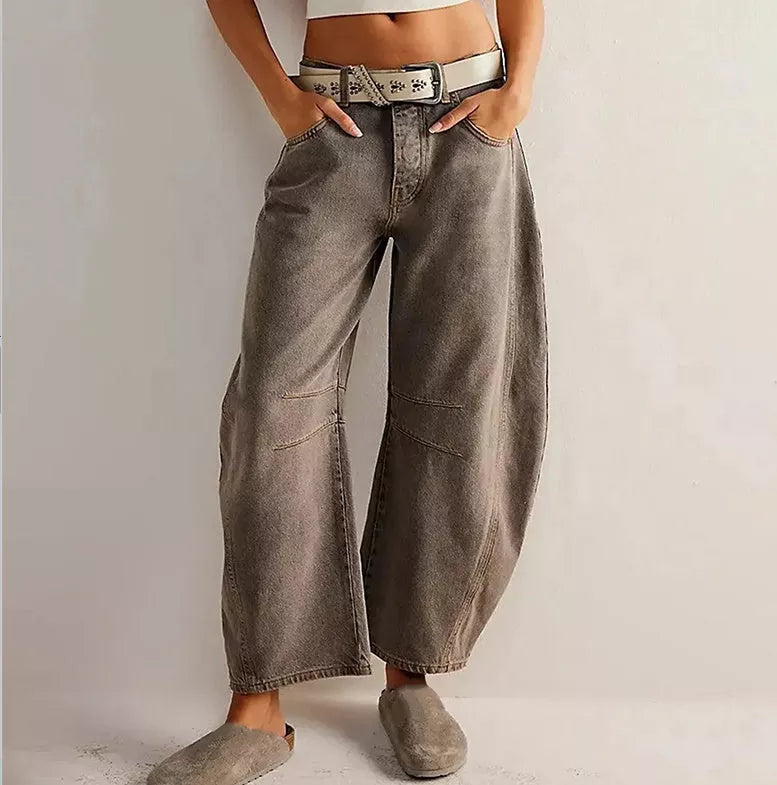 Women's mid-rise barrel jeans with wide leg design in various colors