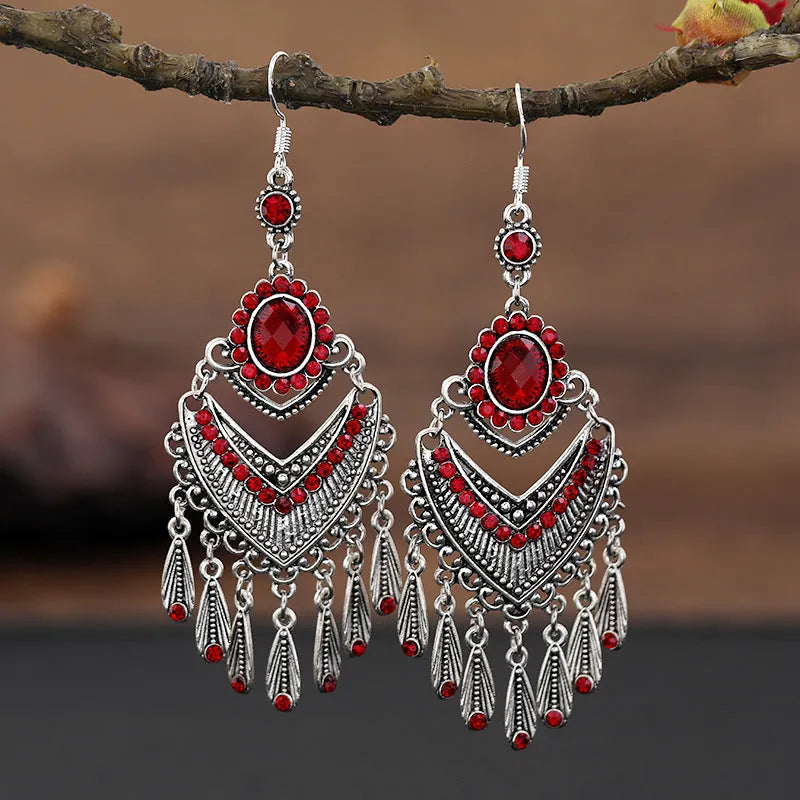 Purple long fringe drop earrings with crystals on a retro ethnic style alloy setting.