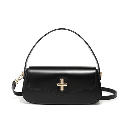 Genuine leather baguette handbag in clamshell design with internal organiser compartments