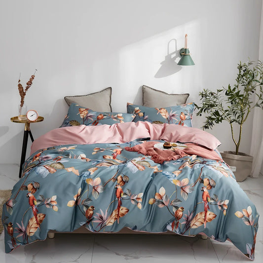 Four-piece cotton bedding set with floral pattern showing fitted sheet, duvet cover, and two pillowcases