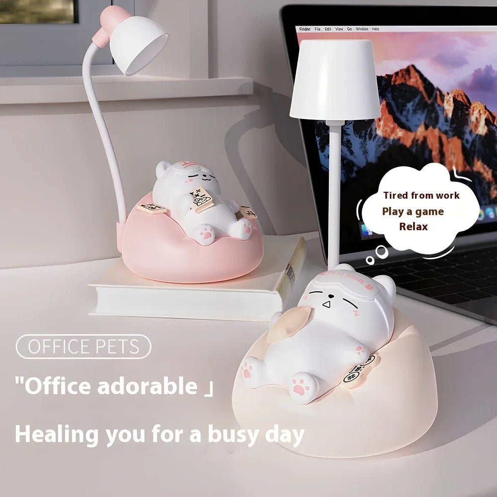 Sleeping cat shaped night lamp with USB charging port and soft LED illumination