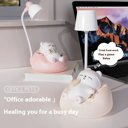 Sleeping cat shaped night lamp with USB charging port and soft LED illumination