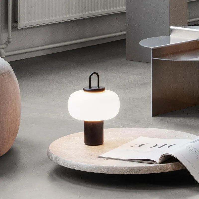 Minimalist Japanese glass bedside table lamp with warm light, 230x330mm dimensions, and UK plug on a children's nightstand.